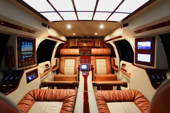 lexani_motorcars_gmc_yukon_xl_conversion_coach_makes_it_easy_to_forget_youre_not_in_a_private_jet_1irex